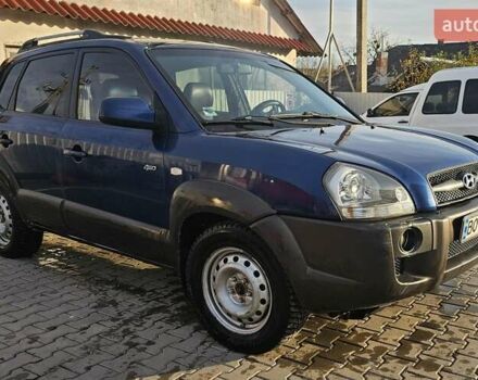 Синий Хендай Туксон, объемом двигателя 1.99 л и пробегом 313 тыс. км за 6000 $, фото 1 на Automoto.ua