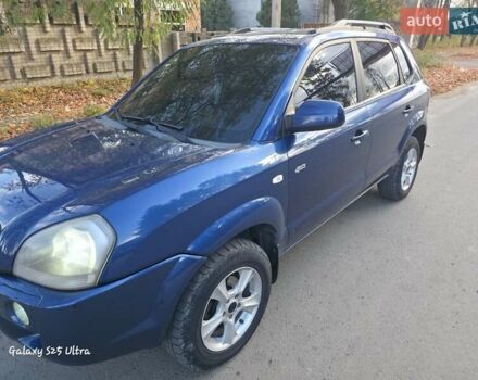 Синий Хендай Туксон, объемом двигателя 1.98 л и пробегом 187 тыс. км за 8400 $, фото 10 на Automoto.ua