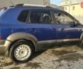 Синий Хендай Туксон, объемом двигателя 1.99 л и пробегом 313 тыс. км за 6000 $, фото 24 на Automoto.ua