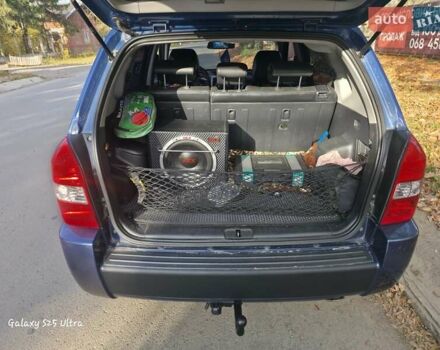 Синий Хендай Туксон, объемом двигателя 1.98 л и пробегом 187 тыс. км за 8400 $, фото 5 на Automoto.ua