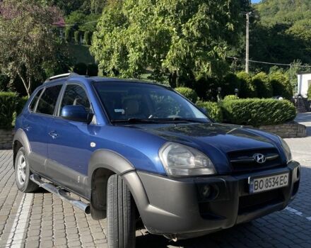 Синій Хендай Туксон, об'ємом двигуна 2 л та пробігом 244 тис. км за 6500 $, фото 5 на Automoto.ua