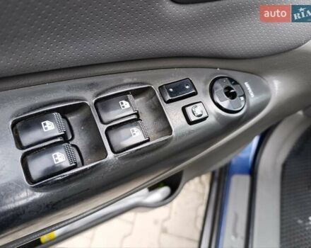 Синий Хендай Туксон, объемом двигателя 2 л и пробегом 314 тыс. км за 6700 $, фото 11 на Automoto.ua