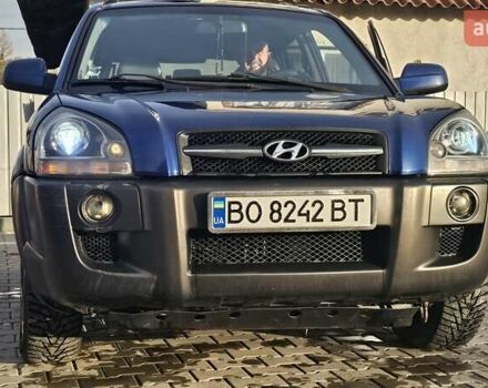 Синий Хендай Туксон, объемом двигателя 1.99 л и пробегом 313 тыс. км за 6000 $, фото 4 на Automoto.ua