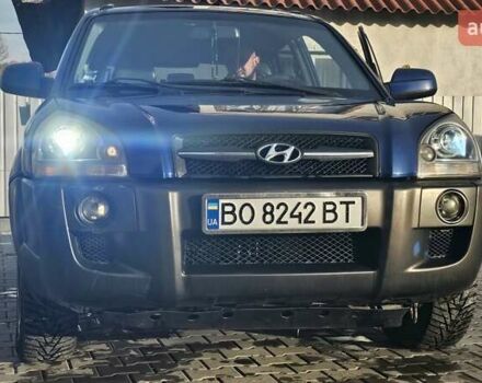 Синий Хендай Туксон, объемом двигателя 1.99 л и пробегом 313 тыс. км за 6000 $, фото 5 на Automoto.ua