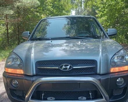 Синій Хендай Туксон, об'ємом двигуна 2 л та пробігом 288 тис. км за 7600 $, фото 3 на Automoto.ua