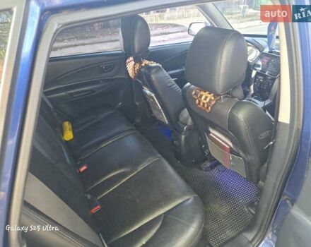 Синий Хендай Туксон, объемом двигателя 1.98 л и пробегом 187 тыс. км за 8400 $, фото 13 на Automoto.ua