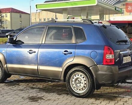 Синий Хендай Туксон, объемом двигателя 1.99 л и пробегом 313 тыс. км за 6000 $, фото 8 на Automoto.ua