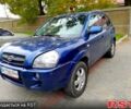 Синій Хендай Туксон, об'ємом двигуна 2 л та пробігом 205 тис. км за 7700 $, фото 4 на Automoto.ua