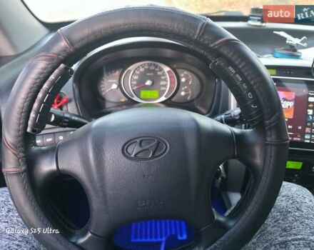 Синий Хендай Туксон, объемом двигателя 1.98 л и пробегом 187 тыс. км за 8400 $, фото 8 на Automoto.ua