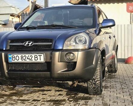 Синий Хендай Туксон, объемом двигателя 1.99 л и пробегом 313 тыс. км за 6000 $, фото 6 на Automoto.ua