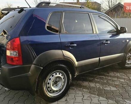 Синий Хендай Туксон, объемом двигателя 1.99 л и пробегом 313 тыс. км за 6000 $, фото 22 на Automoto.ua