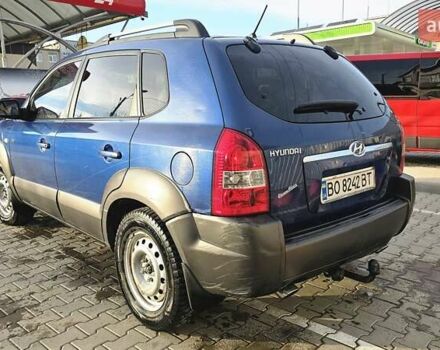 Синий Хендай Туксон, объемом двигателя 1.99 л и пробегом 313 тыс. км за 6000 $, фото 9 на Automoto.ua