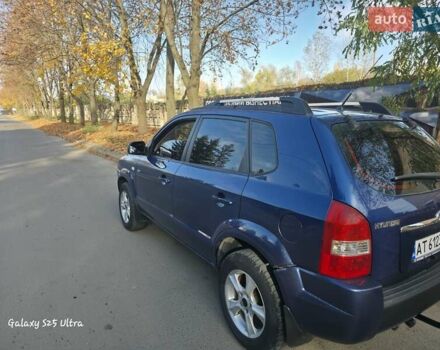 Синий Хендай Туксон, объемом двигателя 1.98 л и пробегом 187 тыс. км за 8400 $, фото 6 на Automoto.ua