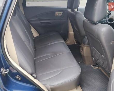 Синій Хендай Туксон, об'ємом двигуна 2 л та пробігом 225 тис. км за 7950 $, фото 14 на Automoto.ua