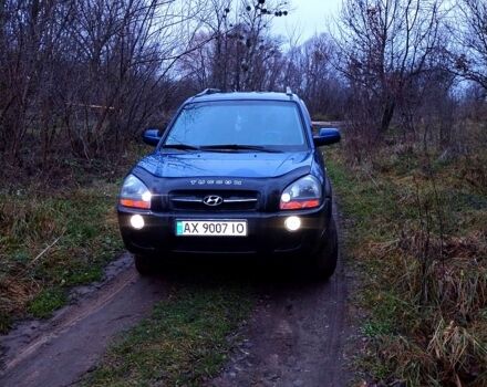 Синий Хендай Туксон, объемом двигателя 2 л и пробегом 219 тыс. км за 8400 $, фото 6 на Automoto.ua