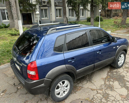 Синий Хендай Туксон, объемом двигателя 2 л и пробегом 190 тыс. км за 7500 $, фото 3 на Automoto.ua