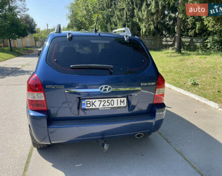 Синий Хендай Туксон, объемом двигателя 1.98 л и пробегом 152 тыс. км за 7450 $, фото 8 на Automoto.ua