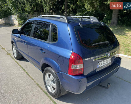 Синий Хендай Туксон, объемом двигателя 1.98 л и пробегом 152 тыс. км за 7450 $, фото 9 на Automoto.ua