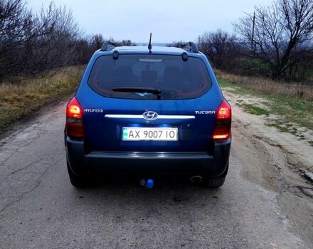 Синий Хендай Туксон, объемом двигателя 2 л и пробегом 219 тыс. км за 8400 $, фото 1 на Automoto.ua