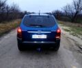 Синий Хендай Туксон, объемом двигателя 2 л и пробегом 219 тыс. км за 8400 $, фото 1 на Automoto.ua