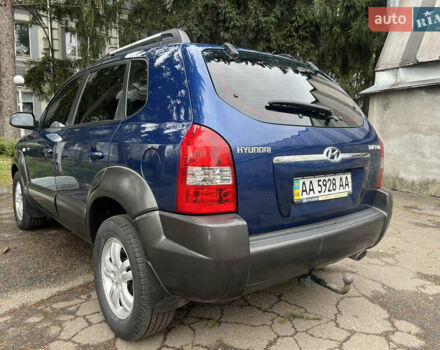 Синий Хендай Туксон, объемом двигателя 2 л и пробегом 190 тыс. км за 7500 $, фото 7 на Automoto.ua