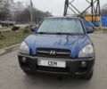 Синий Хендай Туксон, объемом двигателя 2 л и пробегом 225 тыс. км за 7300 $, фото 1 на Automoto.ua
