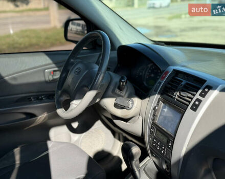 Синій Хендай Туксон, об'ємом двигуна 2 л та пробігом 317 тис. км за 6990 $, фото 6 на Automoto.ua