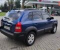Синій Хендай Туксон, об'ємом двигуна 2 л та пробігом 225 тис. км за 7950 $, фото 4 на Automoto.ua