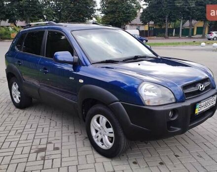 Синій Хендай Туксон, об'ємом двигуна 2 л та пробігом 225 тис. км за 7950 $, фото 2 на Automoto.ua