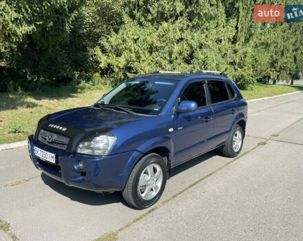 Синий Хендай Туксон, объемом двигателя 1.98 л и пробегом 152 тыс. км за 7450 $, фото 3 на Automoto.ua