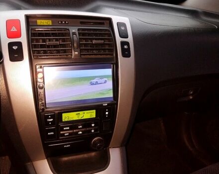 Синий Хендай Туксон, объемом двигателя 2 л и пробегом 219 тыс. км за 8400 $, фото 9 на Automoto.ua