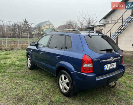 Синій Хендай Туксон, об'ємом двигуна 1.98 л та пробігом 135 тис. км за 7450 $, фото 5 на Automoto.ua