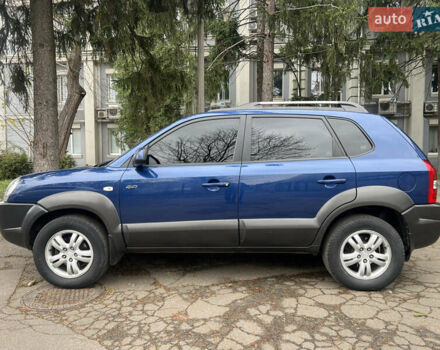 Синий Хендай Туксон, объемом двигателя 2 л и пробегом 190 тыс. км за 7500 $, фото 15 на Automoto.ua