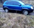 Синий Хендай Туксон, объемом двигателя 2 л и пробегом 219 тыс. км за 8400 $, фото 4 на Automoto.ua