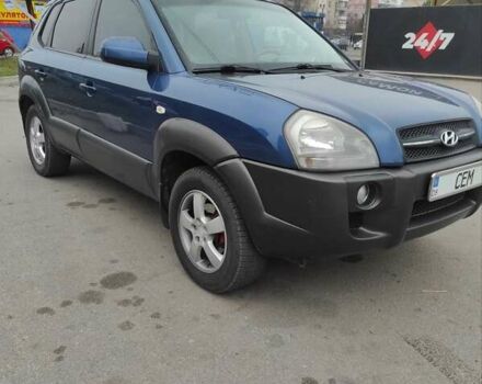 Синий Хендай Туксон, объемом двигателя 2 л и пробегом 225 тыс. км за 7300 $, фото 2 на Automoto.ua