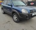 Синий Хендай Туксон, объемом двигателя 2 л и пробегом 225 тыс. км за 7300 $, фото 2 на Automoto.ua