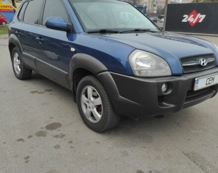 Синий Хендай Туксон, объемом двигателя 2 л и пробегом 225 тыс. км за 7300 $, фото 2 на Automoto.ua