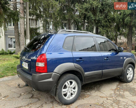 Синий Хендай Туксон, объемом двигателя 2 л и пробегом 190 тыс. км за 7500 $, фото 2 на Automoto.ua