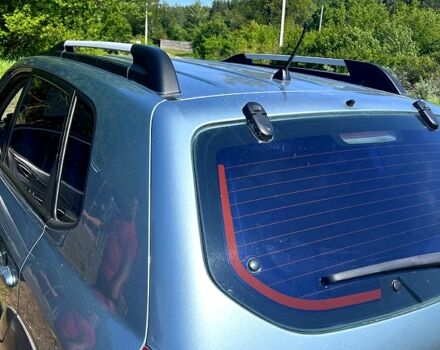 Синий Хендай Туксон, объемом двигателя 2 л и пробегом 280 тыс. км за 7500 $, фото 4 на Automoto.ua