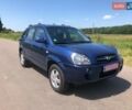 Синий Хендай Туксон, объемом двигателя 2 л и пробегом 124 тыс. км за 7700 $, фото 1 на Automoto.ua