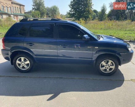 Синий Хендай Туксон, объемом двигателя 1.98 л и пробегом 152 тыс. км за 7450 $, фото 6 на Automoto.ua