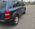 Синий Хендай Туксон, объемом двигателя 2 л и пробегом 225 тыс. км за 7300 $, фото 3 на Automoto.ua