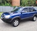 Синій Хендай Туксон, об'ємом двигуна 2 л та пробігом 225 тис. км за 7950 $, фото 1 на Automoto.ua