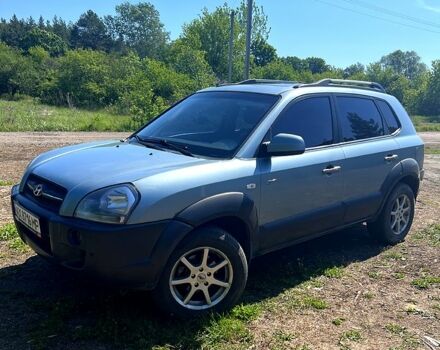 Синий Хендай Туксон, объемом двигателя 2 л и пробегом 280 тыс. км за 7500 $, фото 2 на Automoto.ua