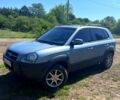 Синий Хендай Туксон, объемом двигателя 2 л и пробегом 280 тыс. км за 7500 $, фото 2 на Automoto.ua