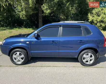 Синий Хендай Туксон, объемом двигателя 1.98 л и пробегом 152 тыс. км за 7450 $, фото 10 на Automoto.ua