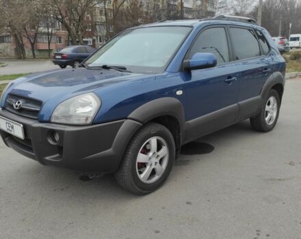 Синий Хендай Туксон, объемом двигателя 2 л и пробегом 225 тыс. км за 7300 $, фото 1 на Automoto.ua