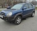 Синий Хендай Туксон, объемом двигателя 2 л и пробегом 225 тыс. км за 7300 $, фото 1 на Automoto.ua