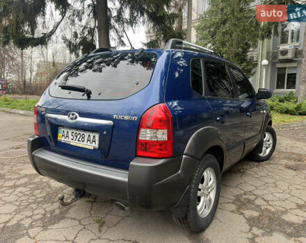 Синий Хендай Туксон, объемом двигателя 2 л и пробегом 190 тыс. км за 7500 $, фото 4 на Automoto.ua