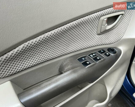 Синий Хендай Туксон, объемом двигателя 2 л и пробегом 190 тыс. км за 7500 $, фото 29 на Automoto.ua